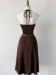 Back view of dark-brown halter dress with tie straps and open back