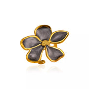 Gold-tone open flower ring with dark gray petals