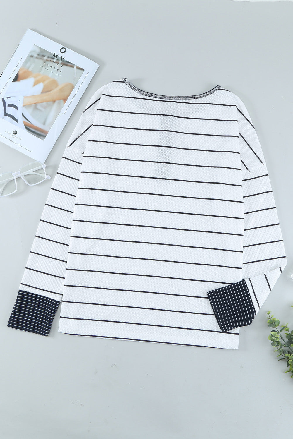 Back product view of striped Henley shirt