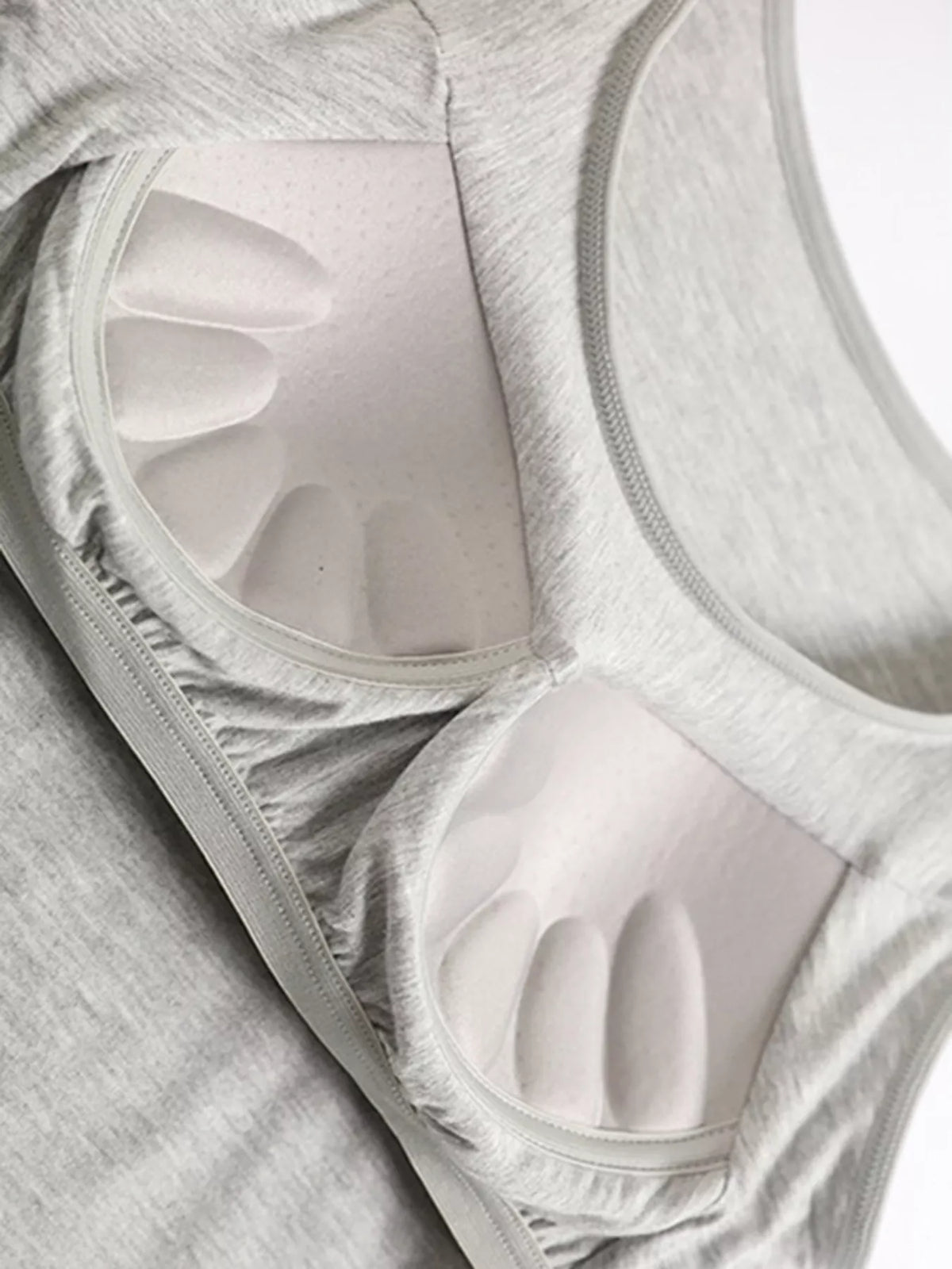 Close-up of padded cups in gray seamless tank