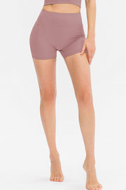 Dusty mauve ribbed shorts shown in close rear view