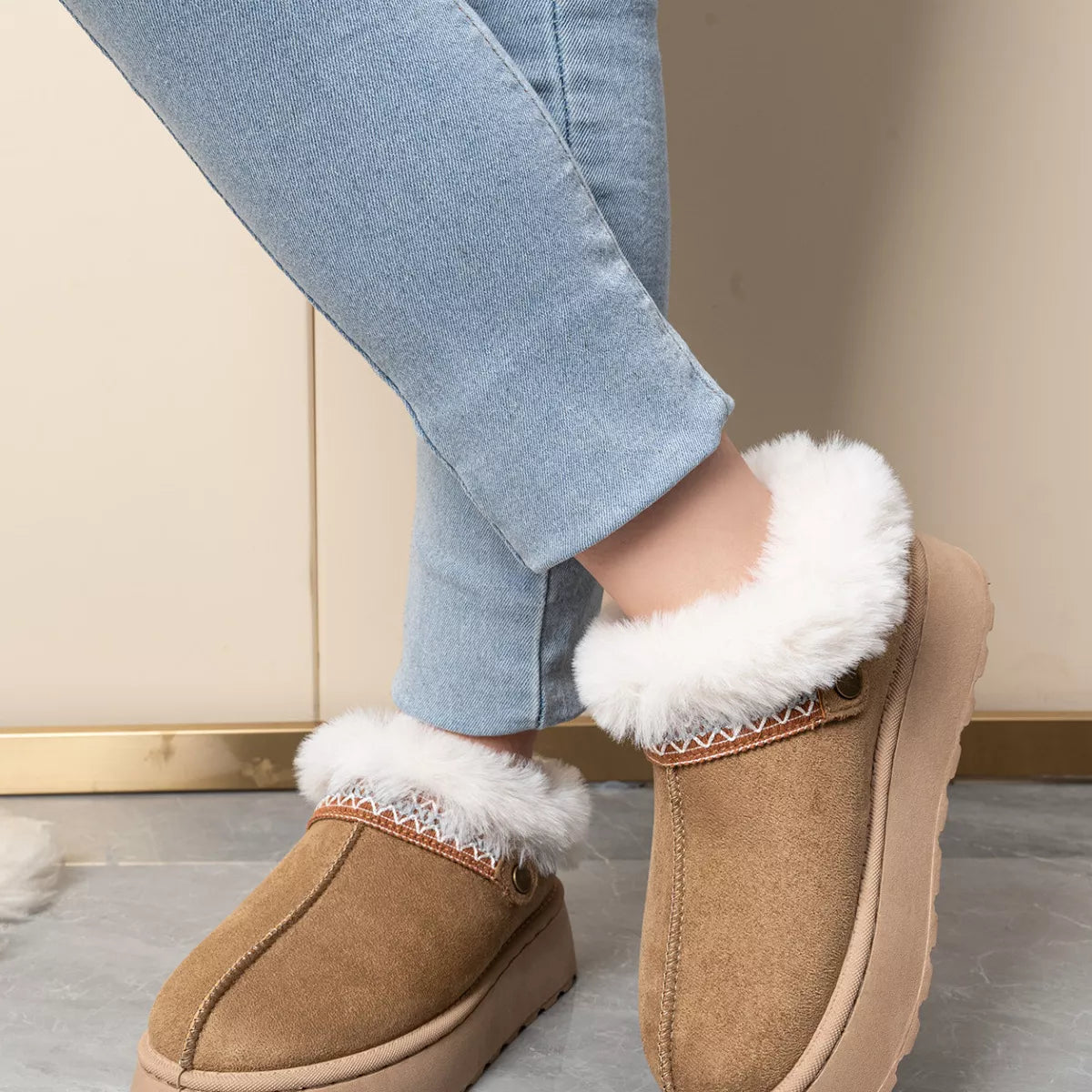 Tan platform ankle boots with white faux-fur lining