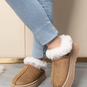 Tan platform ankle boots with white faux-fur lining