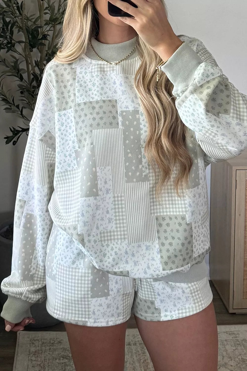 Sage gray patchwork floral pullover and matching shorts shown from the front