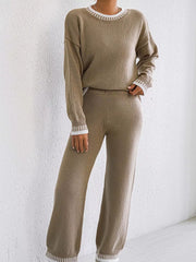 Taupe knit set with the sweater tucked slightly at the waist, front standing view.