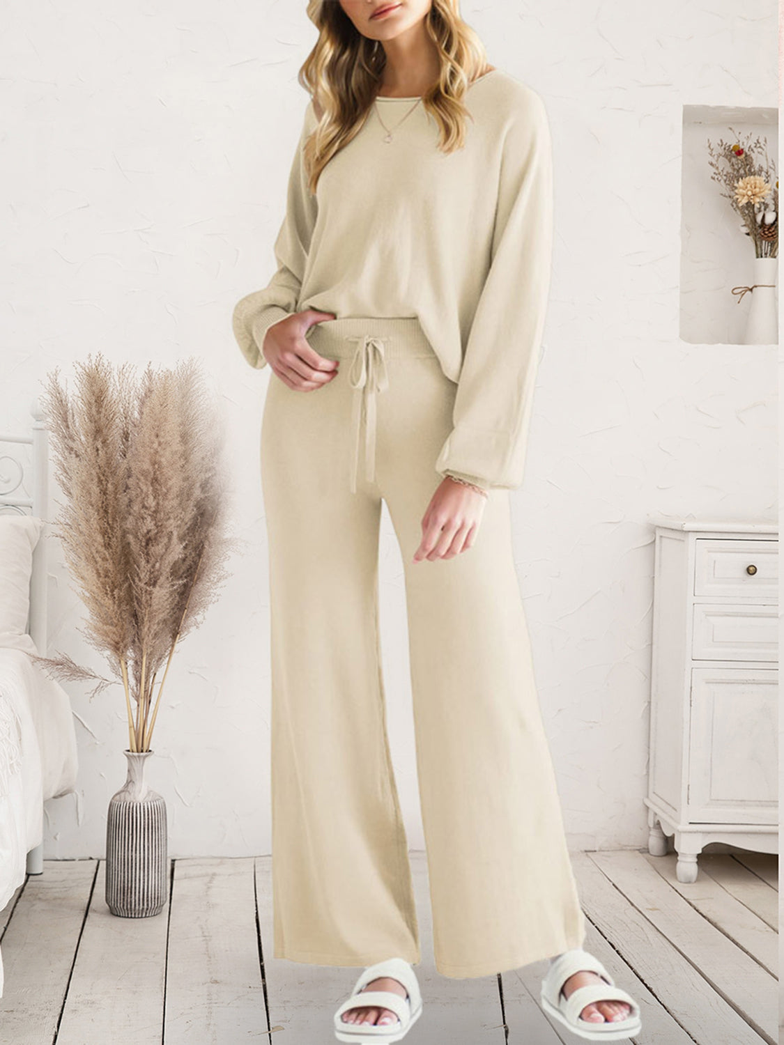 Full-length front view of cream V-neck lounge top and wide-leg pants