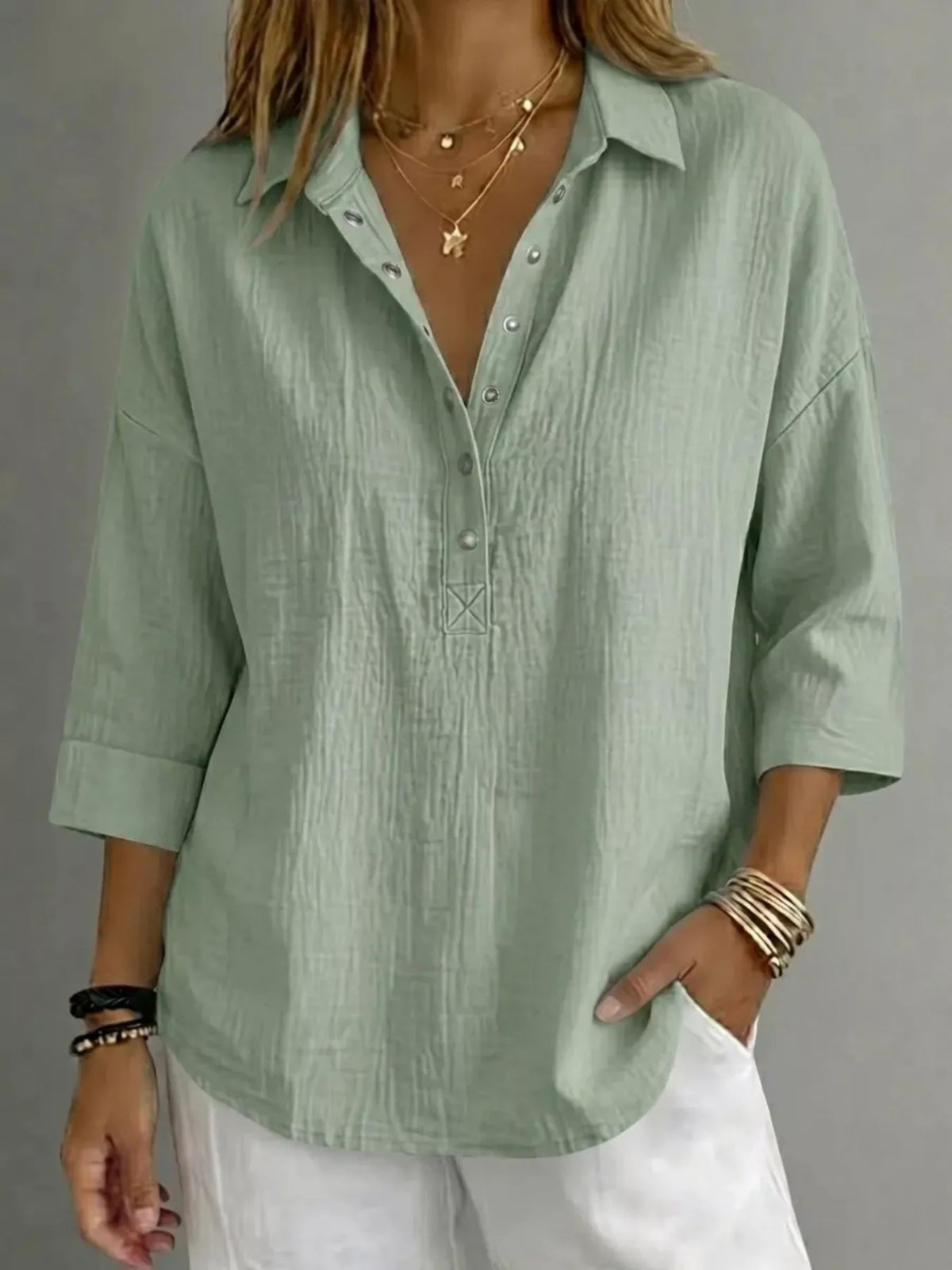 Women's plus-size snap-down 3/4-sleeve blouse, close-up