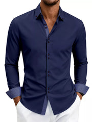 Model wearing light blue shirt showing contrast-trim cuffs