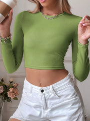 Close front view of the green ribbed crop top and crew neckline