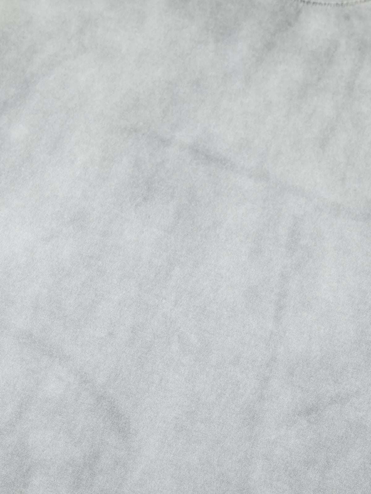 Close-up of pale gray washed T-shirt fabric