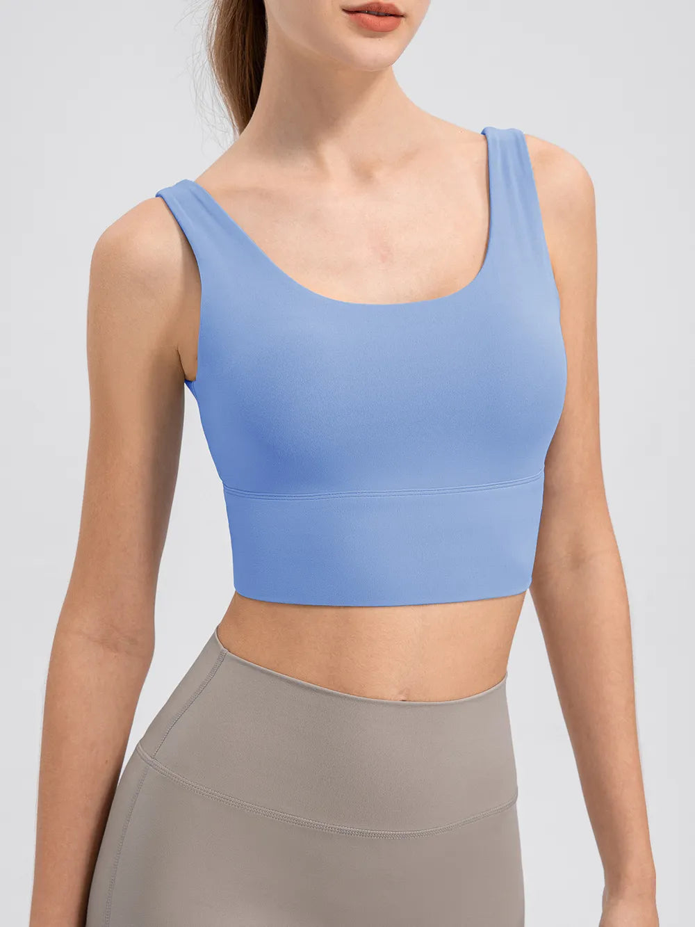 Blue cropped tank with scoop neckline, close front view