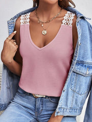 Pink lace-strap tank under denim jacket