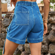Back view of light blue denim cargo shorts with patch pockets.