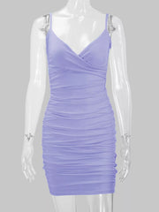 Lavender wrap-front spaghetti-strap ruched mini dress displayed on a mannequin.