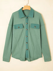 Front view of sage waffle-knit shirt on hanger