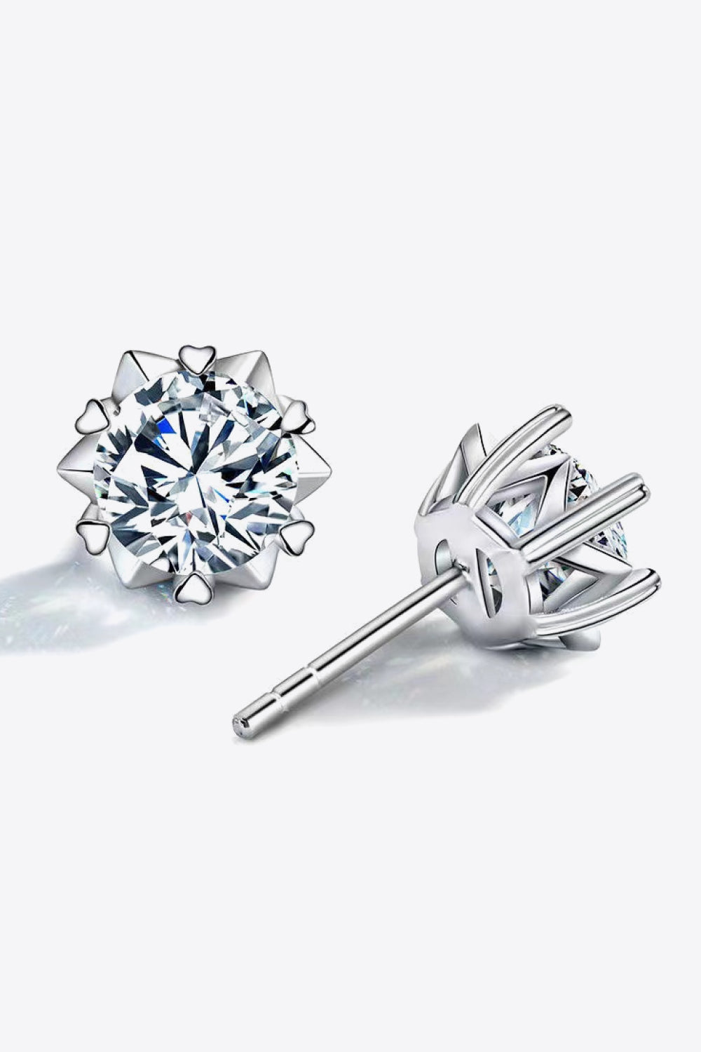 Round stud earrings showing a front setting and rear post
