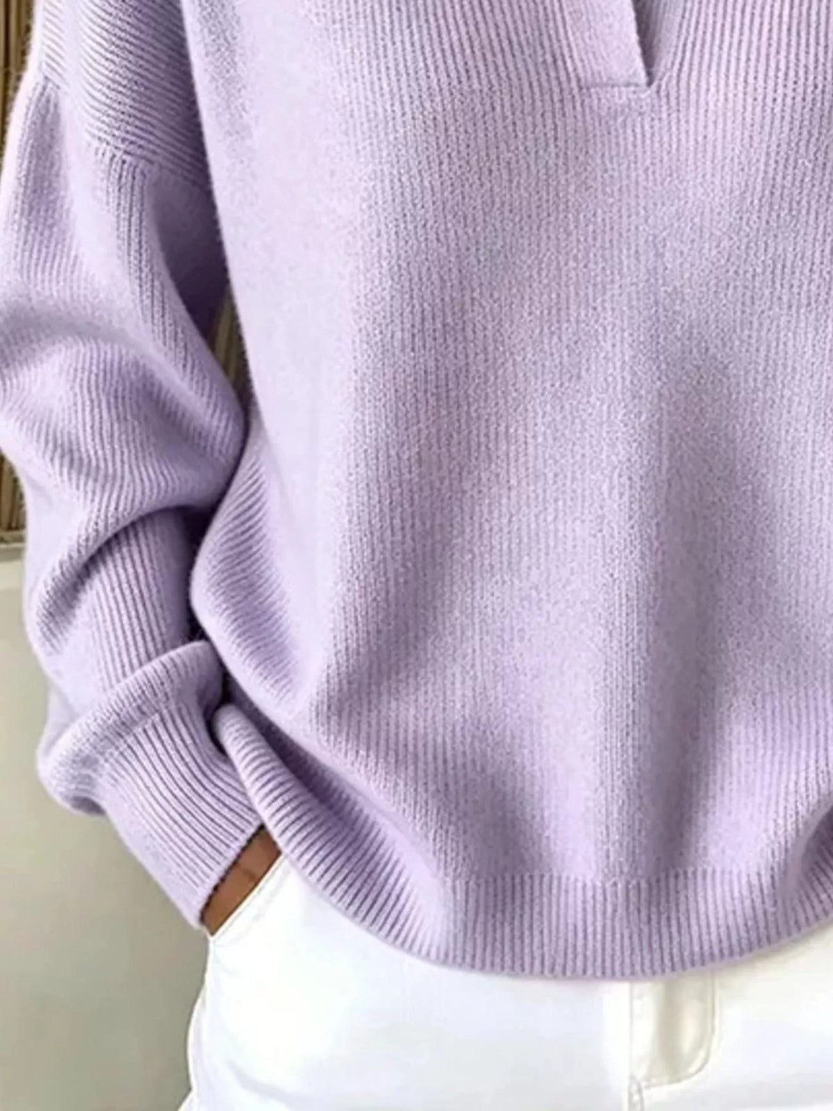 Camel ribbed polo sweater close-up showing collar and knit texture