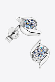 Silver-tone moissanite studs shown with butterfly backs