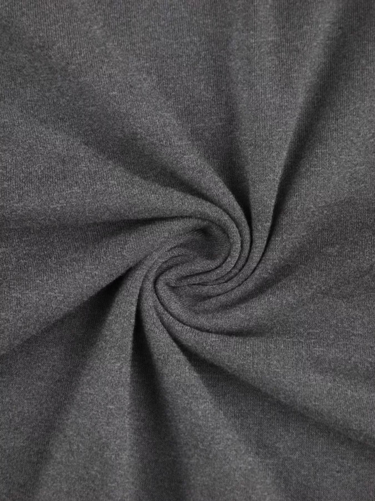 Close-up of the dark gray T-shirt's soft-looking fabric surface