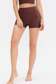Front view of burgundy wide-waistband fitted shorts