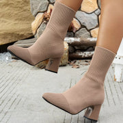 Taupe knit sock boots shown from the side with pointed toes
