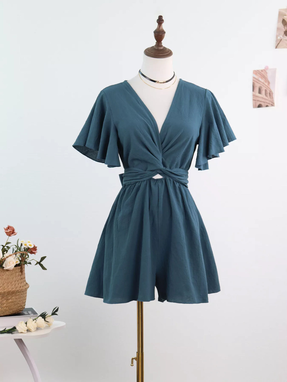 Haze blue flutter-sleeve romper on mannequin, front