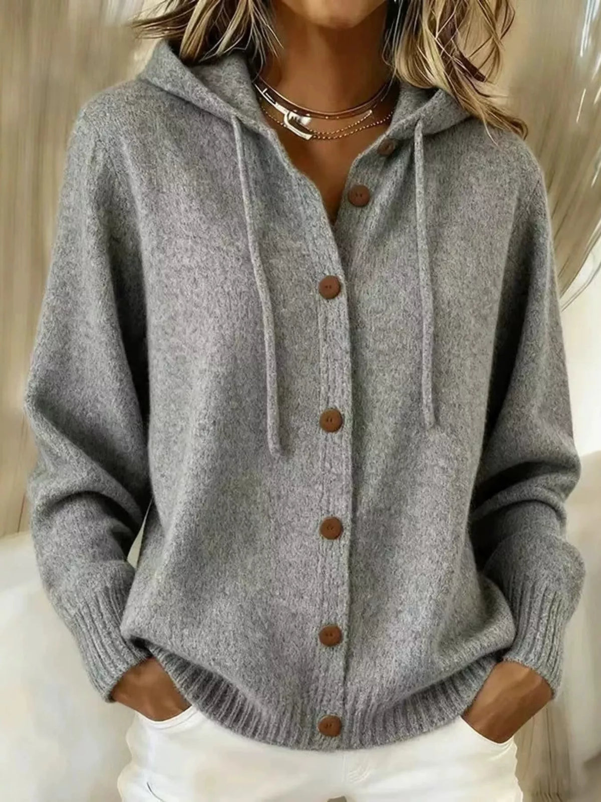 Gray hooded button-front knit cardigan with brown buttons, front view