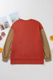 Back product view of rust sweatshirt laid flat