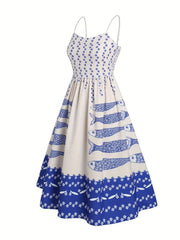 Front product view of a white smocked midi dress with blue floral and sardine motifs.