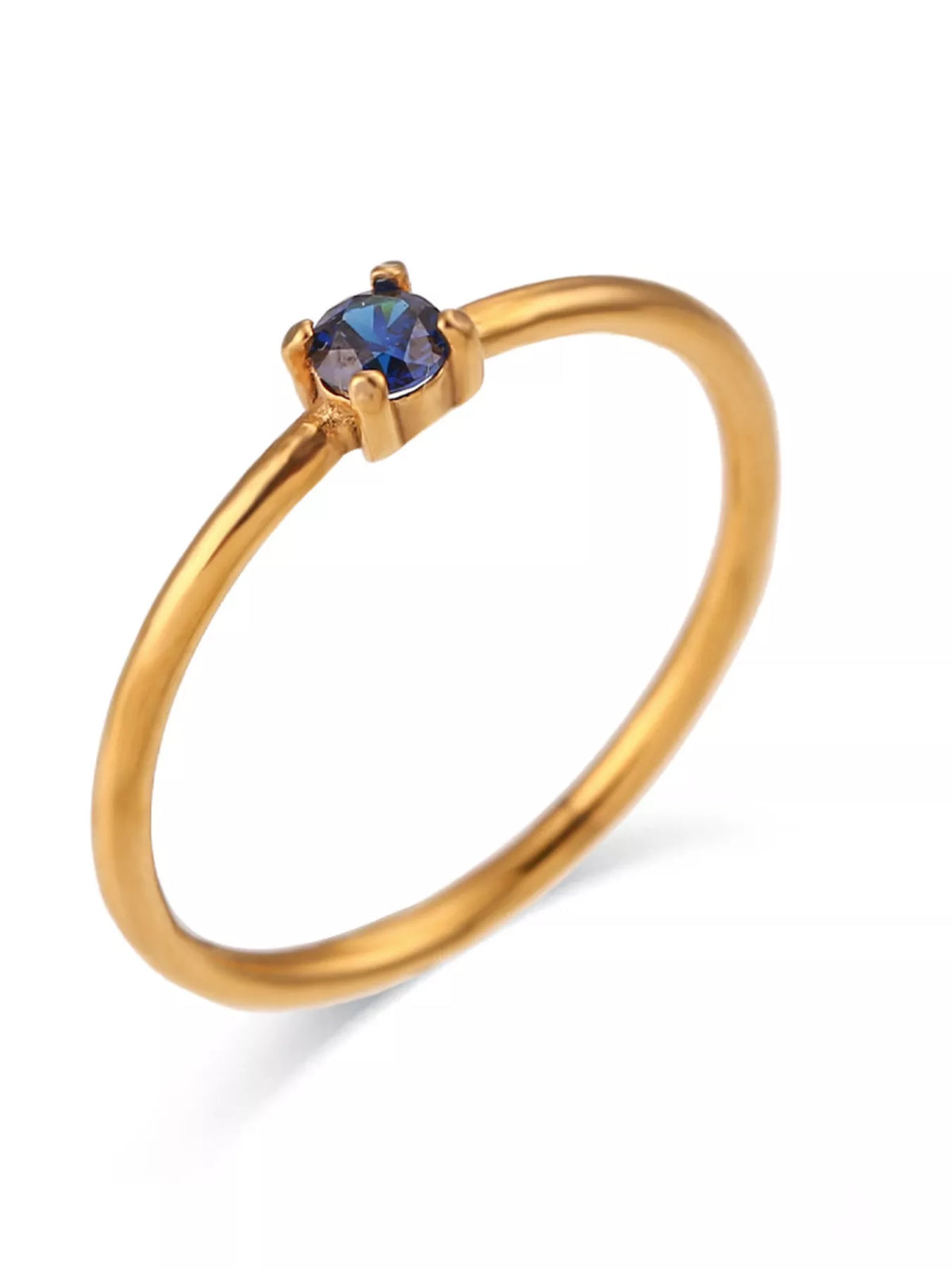 Gold-tone ring with blue round stone, product view