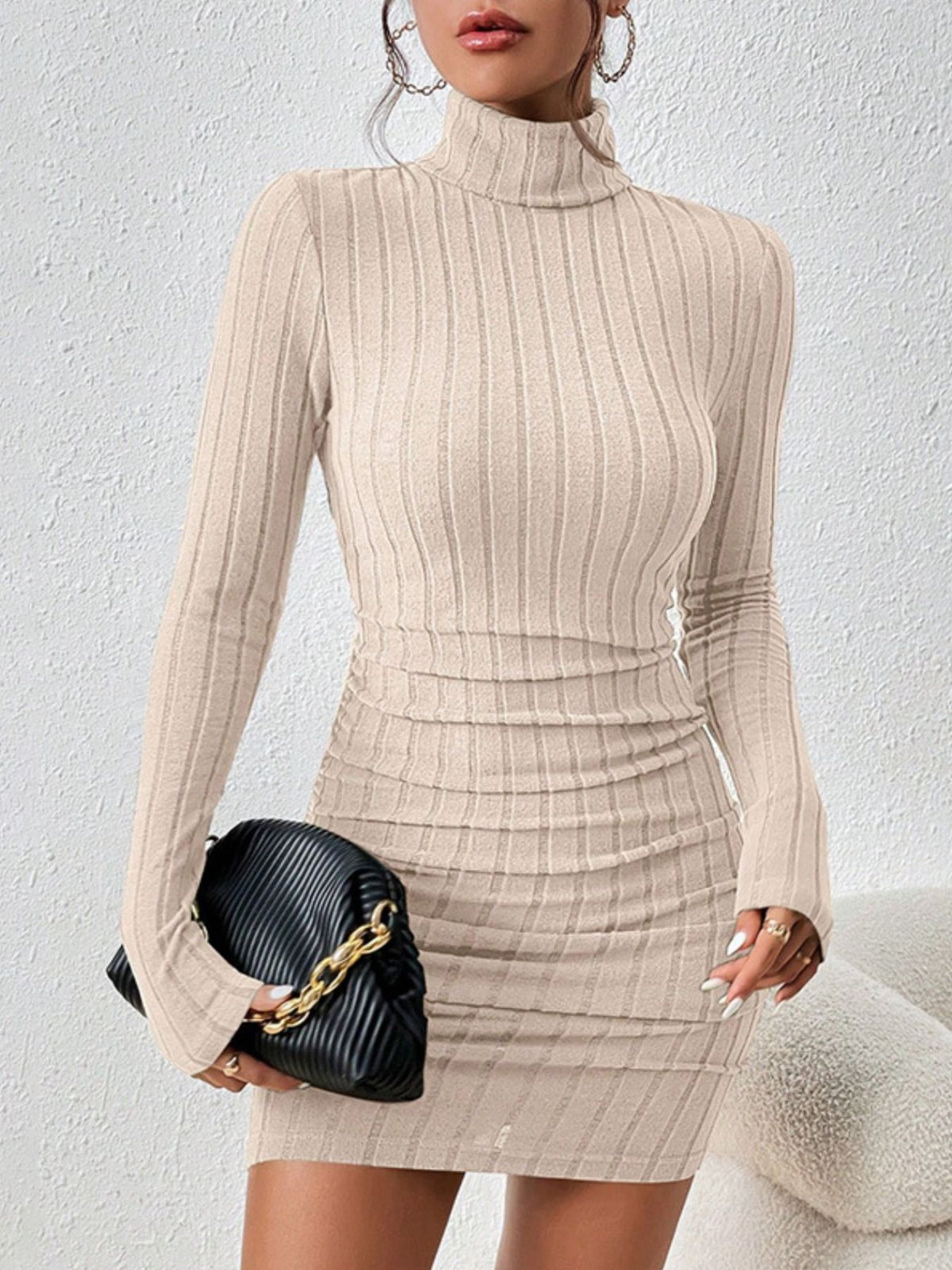 Front view of beige ribbed turtleneck mini dress