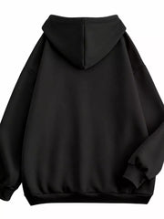 Back view of the black hoodie with oversized hood and ribbed hem