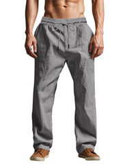 Model wearing gray loose-fit pants, front view