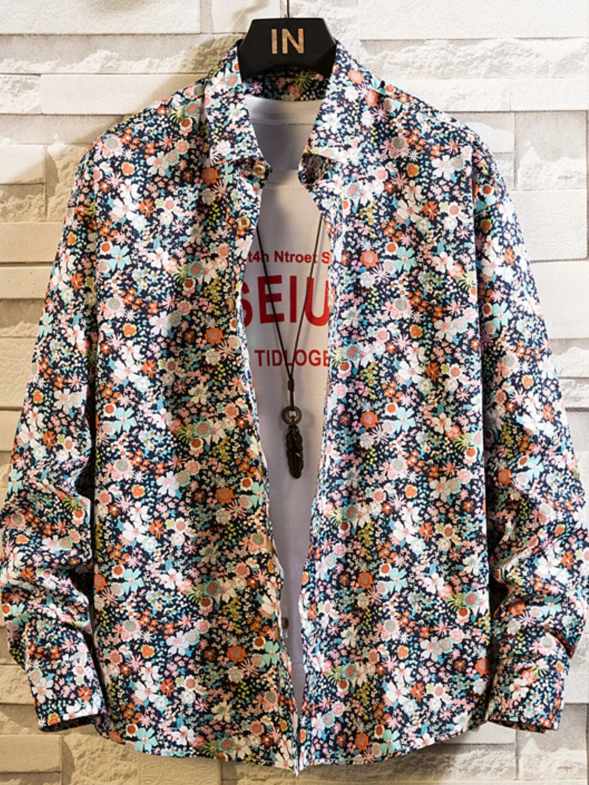 Button-up shirt with dense multicolor floral print, front view