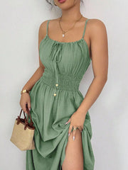 Matcha green smocked dress with side slit, closer view