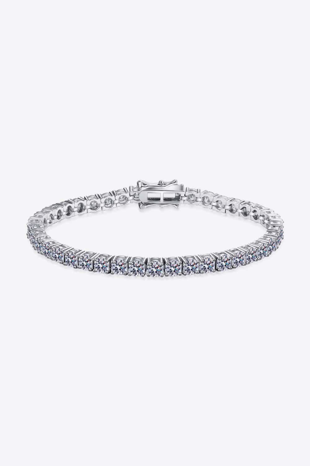 Full circular view of the slim silver moissanite bracelet on a white background.