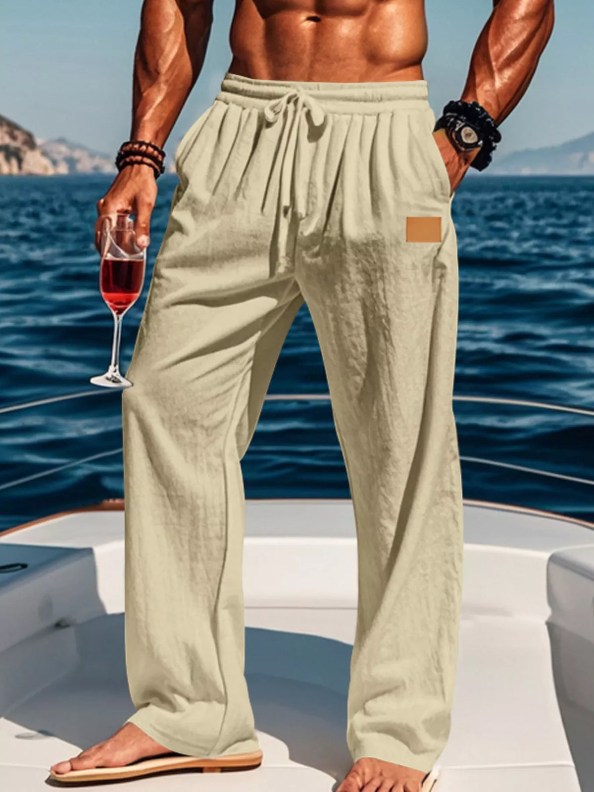 Cream wide-leg drawstring pants shown on a model