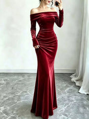 Burgundy velvet maxi dress with ruched front and fitted sleeves