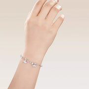 Double-layer ginkgo leaf bracelet worn on a wrist