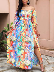 Model in a brightly colored printed off-shoulder maxi dress, showing its flowing skirt.