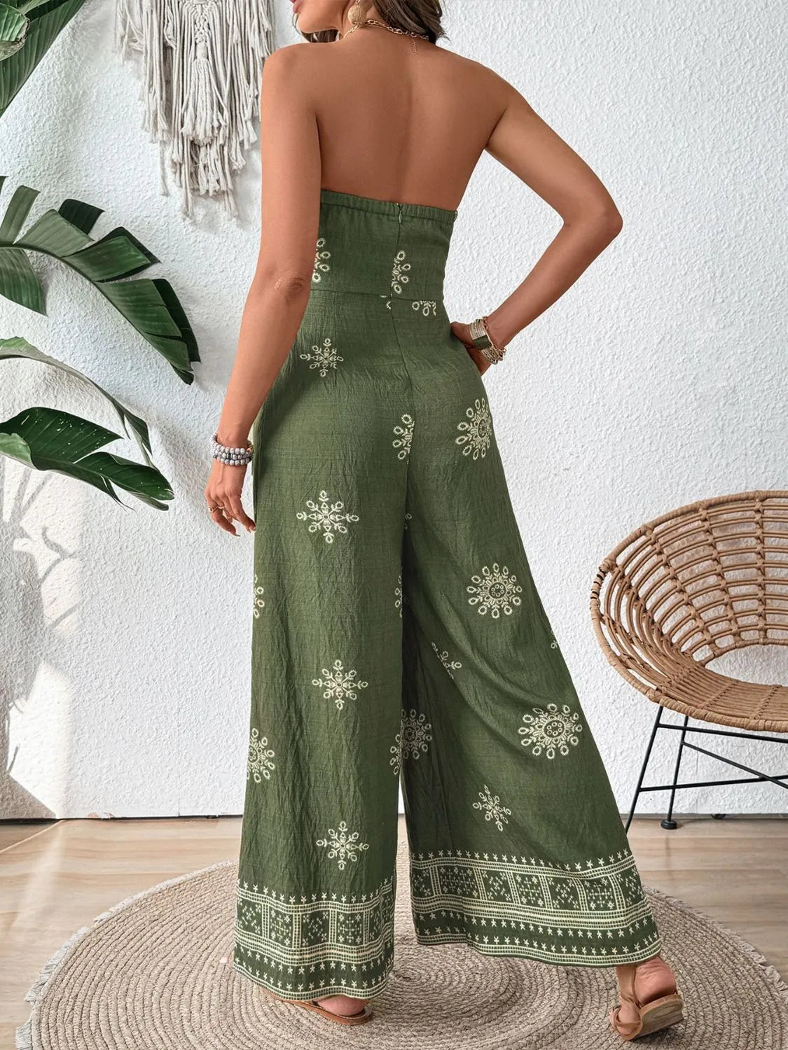 Back view of strapless jumpsuit showing smocked bodice