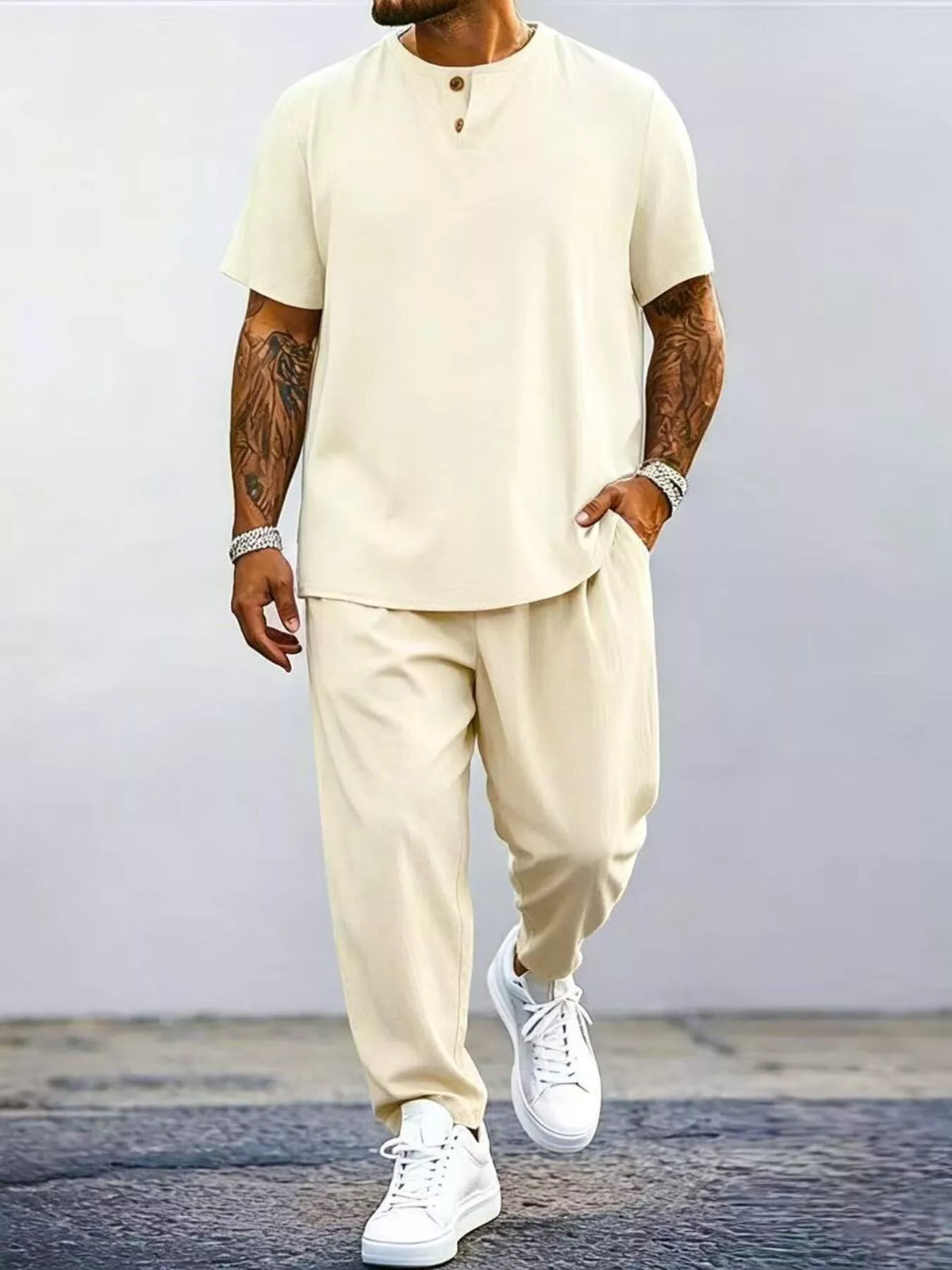 Model wearing cream short-sleeve top and matching pants