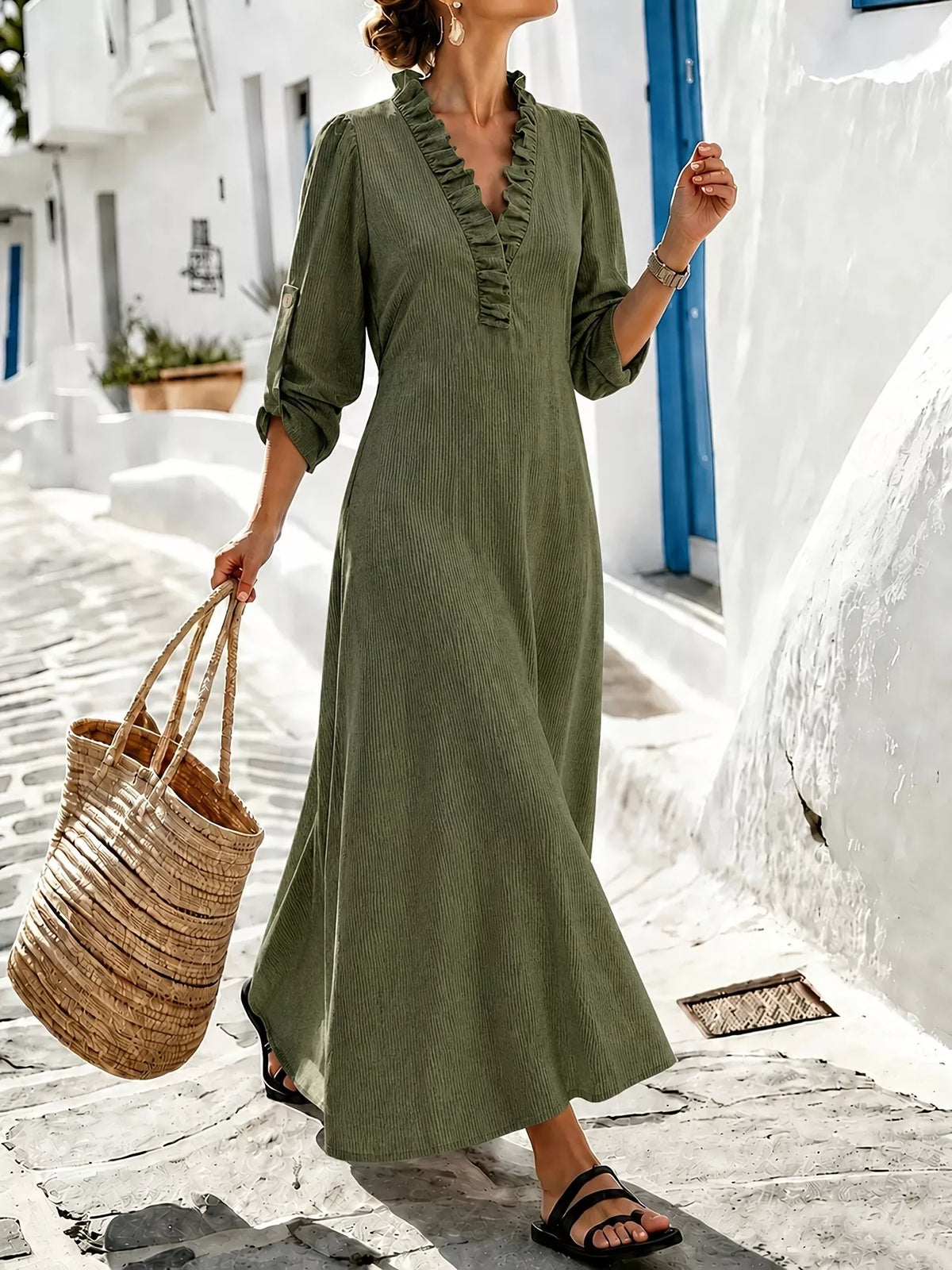 Olive V-neck maxi dress with roll-up sleeves styled with woven tote