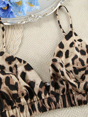 Close view of leopard-print bra strap and gathered elastic band