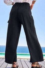 Back view of black wide-leg utility trousers