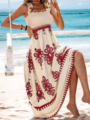 Close view of burgundy print and flowing cream maxi skirt