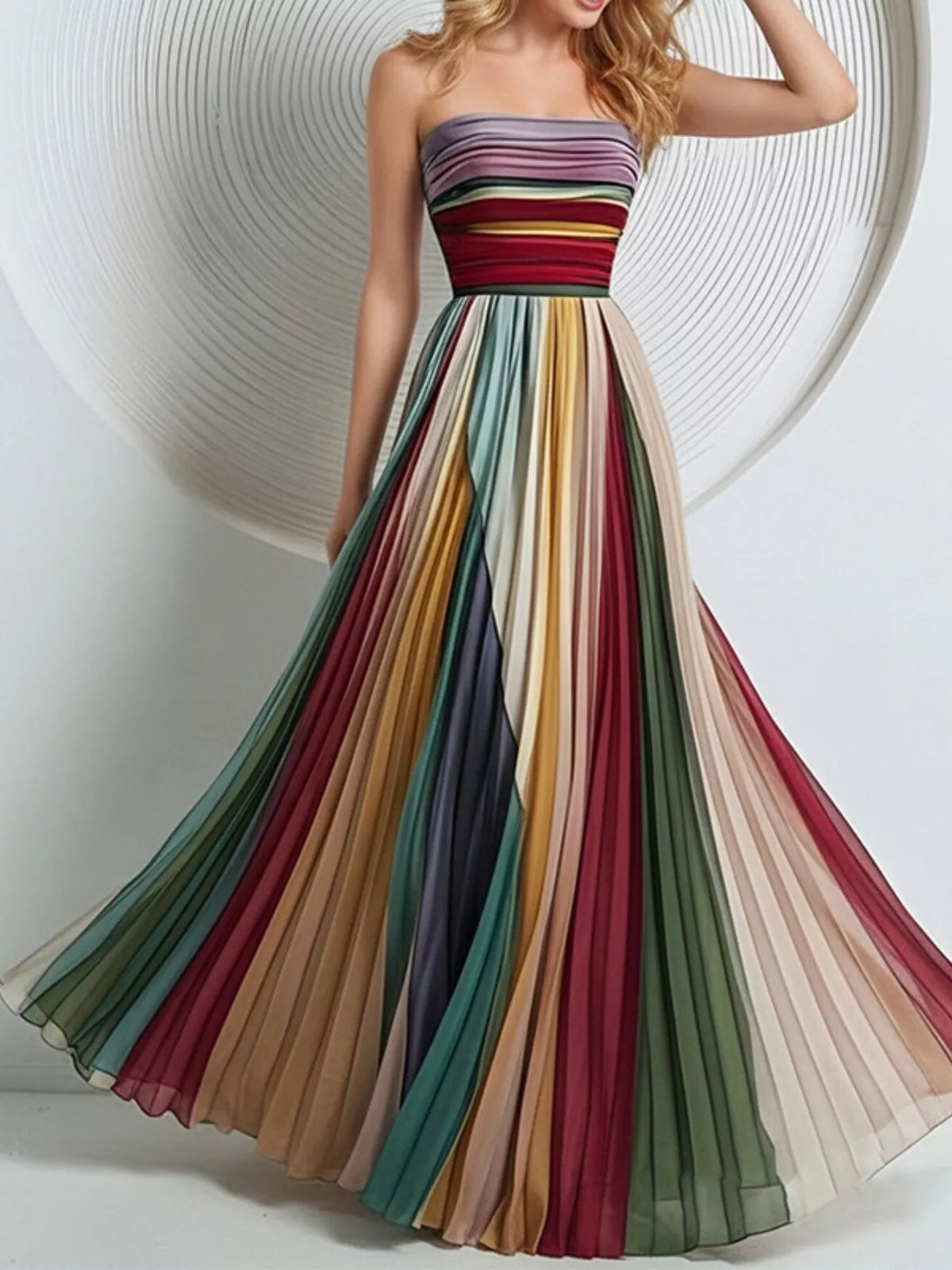 Model wearing multicolor striped pleated tube maxi dress