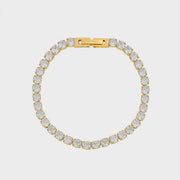 Gold-tone tennis bracelet set with a continuous row of round clear stones