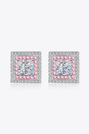 Pair of square stud earrings with pink and clear stone borders, front view