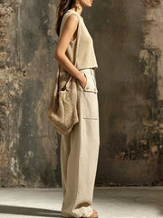 Side view of beige sleeveless crop top and cargo pants with side pockets